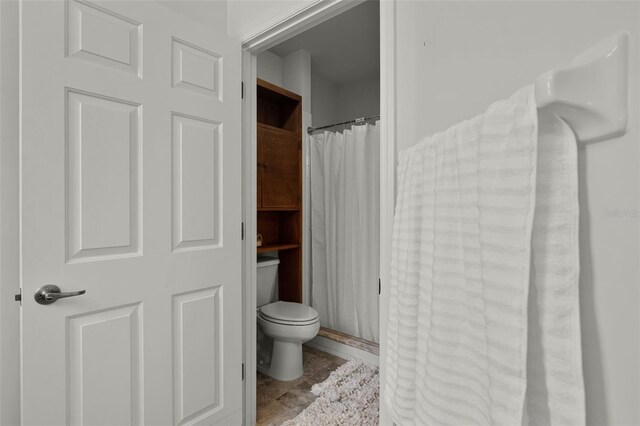 bathroom featuring toilet
