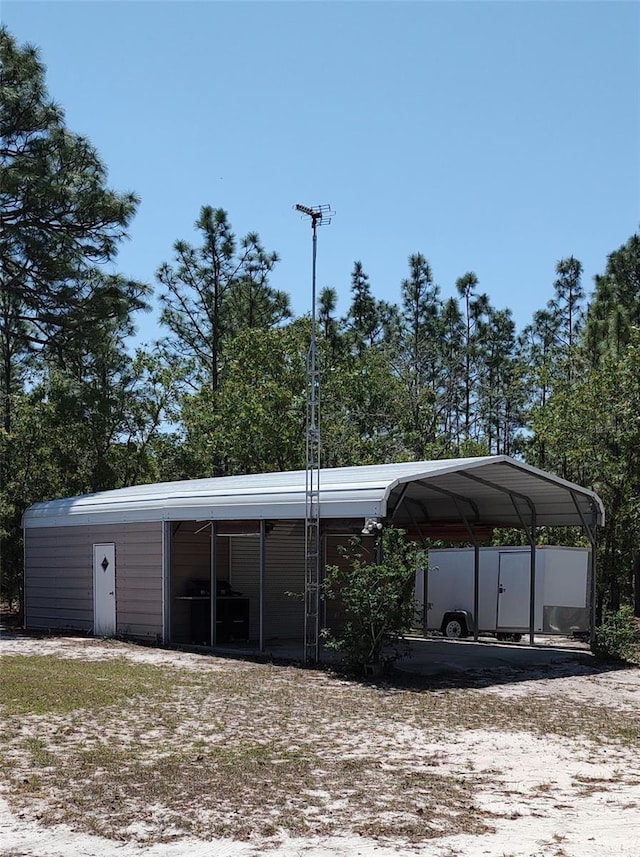 view of parking featuring a carport
