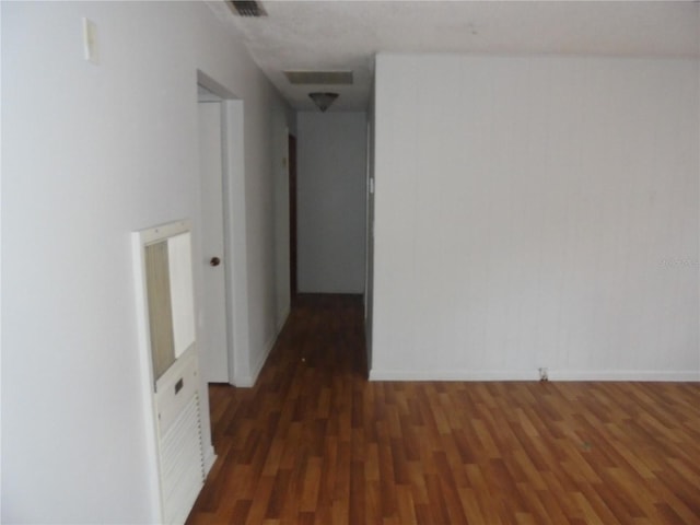 2912 NE 24th Ct, Ocala, FL 34479 - interior space with baseboards, wood finished floors, and visible vents