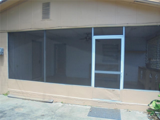 2912 NE 24th Ct, Ocala, FL 34479 - view of side of property featuring a sunroom