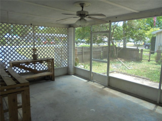 2912 NE 24th Ct, Ocala, FL 34479 - unfurnished sunroom featuring a ceiling fan and a healthy amount of sunlight