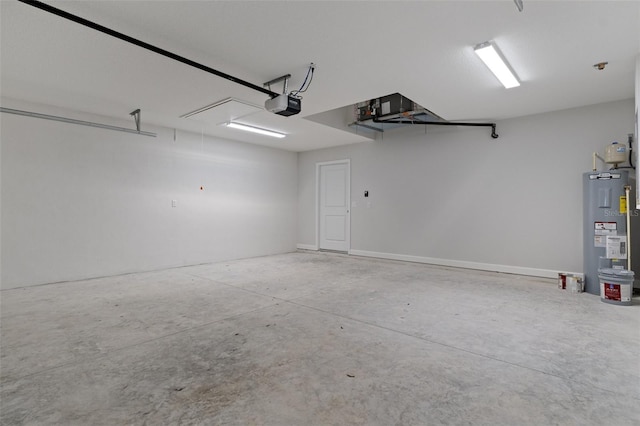 garage featuring a garage door opener and water heater
