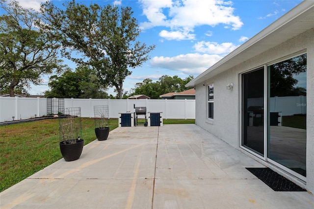 view of patio featuring a fenced backyard