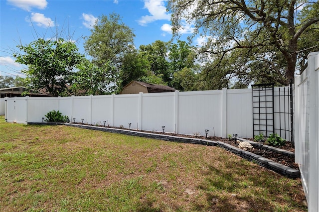 view of yard featuring a fenced backyard