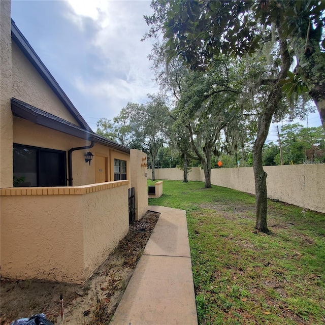view of yard with fence