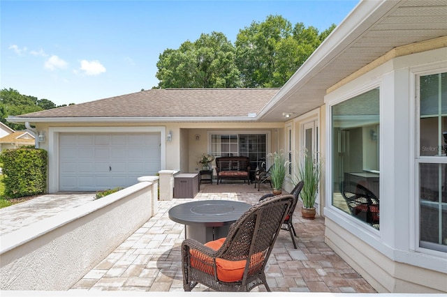 6858 SW 111th Loop, Ocala, FL 34476 - view of patio / terrace with an attached garage
