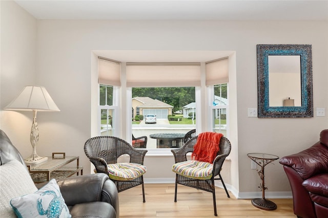 6858 SW 111th Loop, Ocala, FL 34476 - sitting room with baseboards and wood finished floors