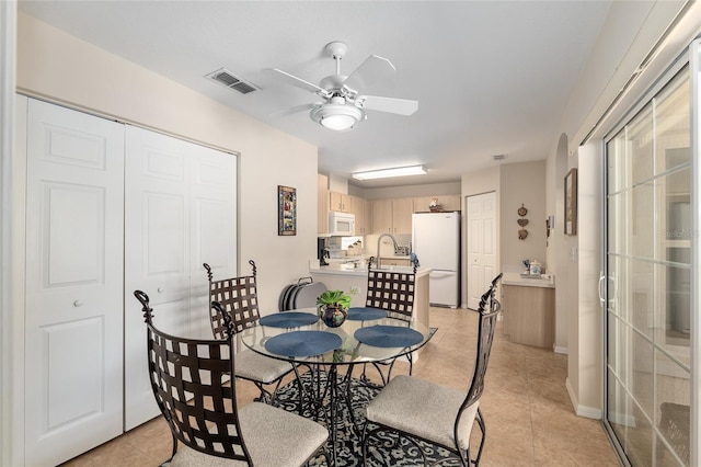 6858 SW 111th Loop, Ocala, FL 34476 - dining room with a ceiling fan, visible vents, and light tile patterned floors