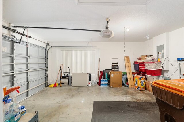 6858 SW 111th Loop, Ocala, FL 34476 - garage featuring a garage door opener and electric panel