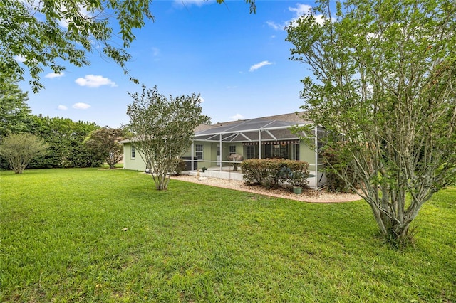 4966 SW 107th Loop, Ocala, FL 34476 - rear view of property with a lawn, a lanai, and a patio area