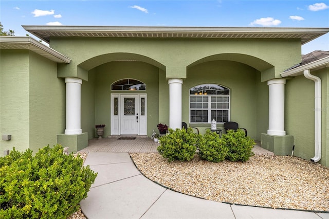 4966 SW 107th Loop, Ocala, FL 34476 - entrance to property featuring stucco siding and a porch