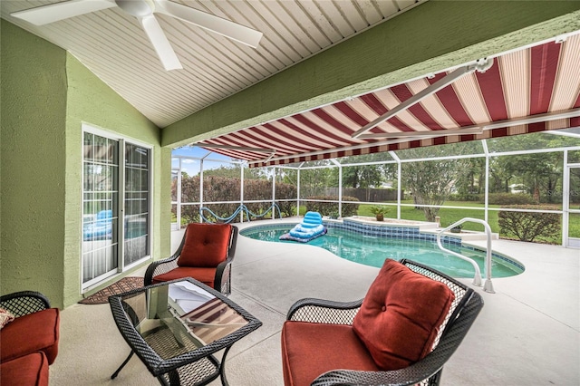 4966 SW 107th Loop, Ocala, FL 34476 - outdoor pool with a patio, a ceiling fan, a fenced backyard, and glass enclosure