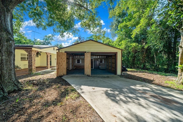 31 N Harrison St, Beverly Hills, FL 34465 - exterior space with a detached garage