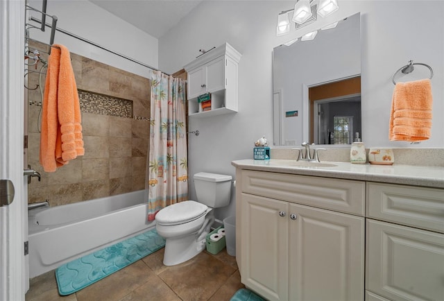 full bath featuring vanity, toilet, tile patterned floors, and shower / tub combo