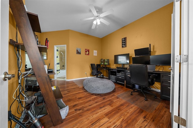 office space with baseboards, a ceiling fan, and wood finished floors