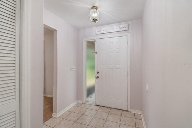 1406 SE Wacahoota Rd, Micanopy, FL 32667 - entryway featuring light tile patterned flooring and baseboards