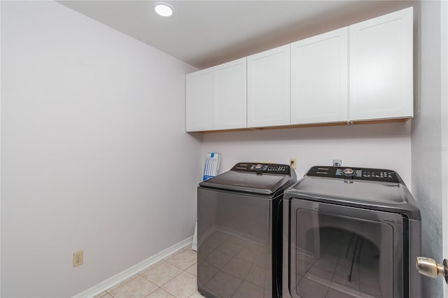 1406 SE Wacahoota Rd, Micanopy, FL 32667 - washroom with cabinet space, separate washer and dryer, baseboards, light tile patterned floors, and recessed lighting