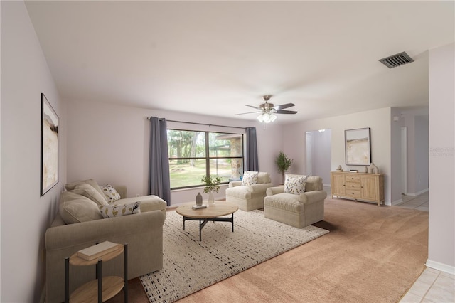 1406 SE Wacahoota Rd, Micanopy, FL 32667 - living room with ceiling fan, light carpet, and baseboards