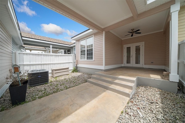view of patio with central AC, french doors, and a ceiling fan