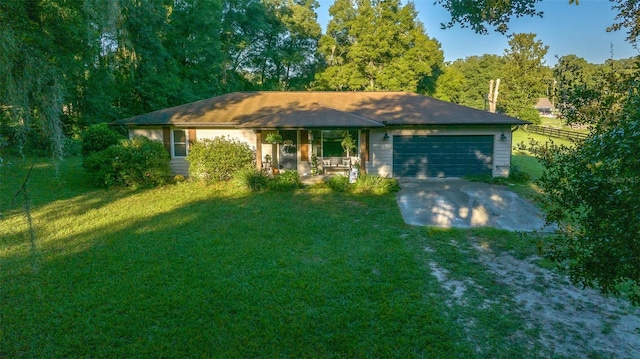 13232 NE 39th Ter, Anthony, FL 32617 - view of front of house featuring an attached garage, driveway, and a front yard
