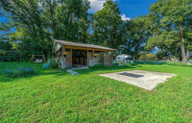 13232 NE 39th Ter, Anthony, FL 32617 - view of yard featuring an outbuilding and fence