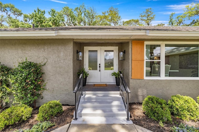 5326 NW 76th Ct, Ocala, FL 34482 - doorway to property featuring french doors and stucco siding