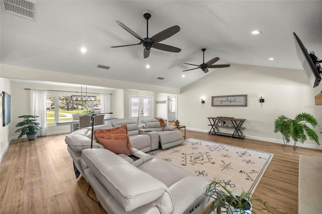5326 NW 76th Ct, Ocala, FL 34482 - living room with a ceiling fan, lofted ceiling, baseboards, recessed lighting, and wood finished floors