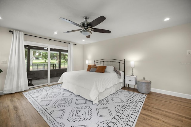 5326 NW 76th Ct, Ocala, FL 34482 - bedroom with access to exterior, baseboards, wood finished floors, recessed lighting, and ceiling fan