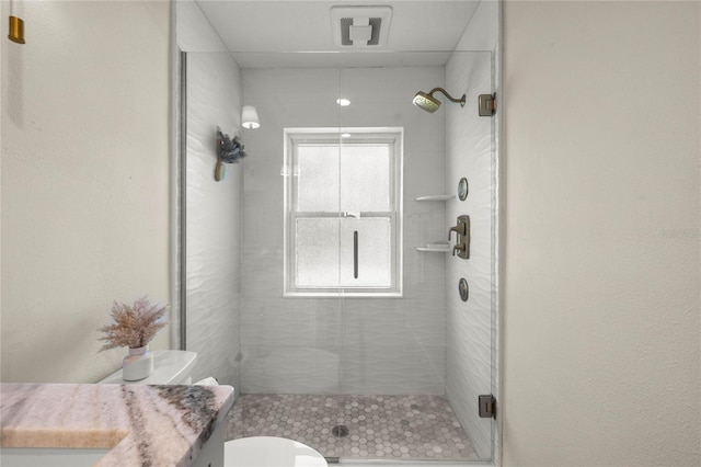 5326 NW 76th Ct, Ocala, FL 34482 - full bathroom featuring a shower stall, toilet, and vanity