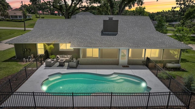 5326 NW 76th Ct, Ocala, FL 34482 - pool at dusk with a patio and outdoor lounge area