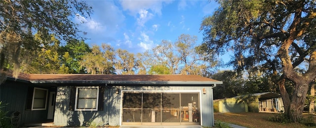 2151 SE 177th Ave, Silver Springs, FL 34488 - view of side of property with a garage and a carport