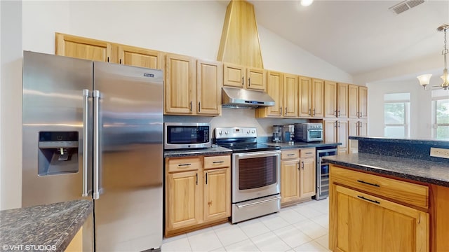 kitchen featuring visible vents, under cabinet range hood, appliances with stainless steel finishes, lofted ceiling, and wine cooler
