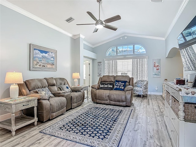 living area with light wood-style flooring, crown molding, visible vents, ceiling fan, and lofted ceiling