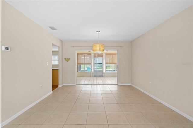 8130 SW 209th Court Rd, Dunnellon, FL 34431 - unfurnished room featuring light tile patterned floors and baseboards
