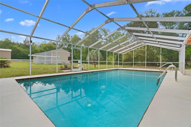 8130 SW 209th Court Rd, Dunnellon, FL 34431 - outdoor pool with a lawn, a lanai, and an outdoor structure