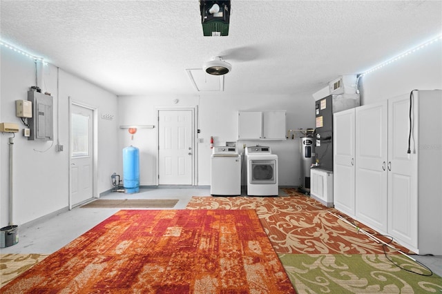 8130 SW 209th Court Rd, Dunnellon, FL 34431 - garage featuring washer and dryer, electric panel, and baseboards