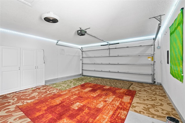 8130 SW 209th Court Rd, Dunnellon, FL 34431 - garage featuring a garage door opener and baseboards