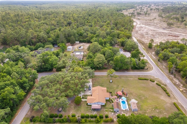 8130 SW 209th Court Rd, Dunnellon, FL 34431 - aerial view of property's location featuring a forest and a pool area