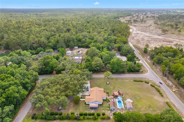 8130 SW 209th Court Rd, Dunnellon, FL 34431 - aerial overview of property's location featuring a heavily wooded area