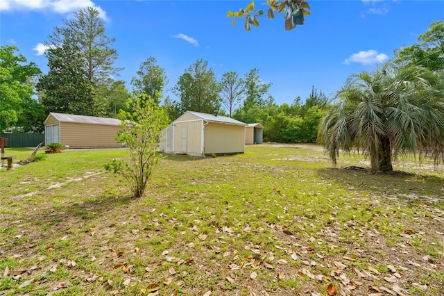 8130 SW 209th Court Rd, Dunnellon, FL 34431 - view of yard featuring a storage shed and an outbuilding