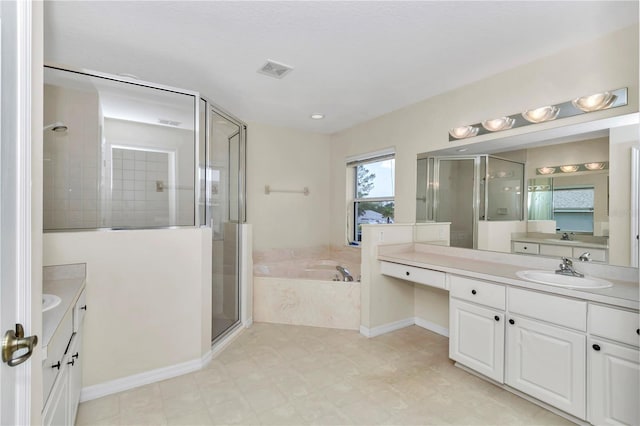 bathroom featuring visible vents, a sink, two vanities, and a shower stall