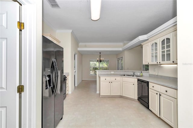 kitchen with visible vents, crown molding, black appliances, a peninsula, and a chandelier