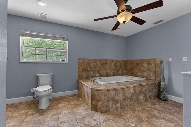 260 Country Circle Dr W, Port Orange, FL 32128 - full bathroom with toilet, baseboards, ceiling fan, visible vents, and a garden tub
