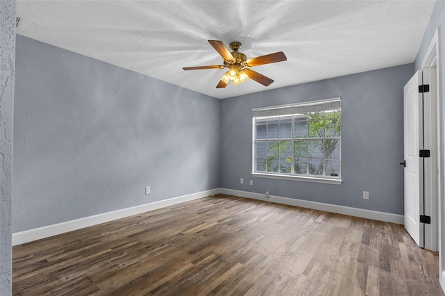 260 Country Circle Dr W, Port Orange, FL 32128 - empty room with baseboards, a ceiling fan, and wood finished floors