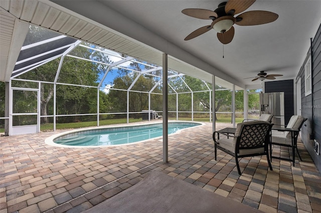 260 Country Circle Dr W, Port Orange, FL 32128 - outdoor pool with a patio area, a lanai, and a ceiling fan