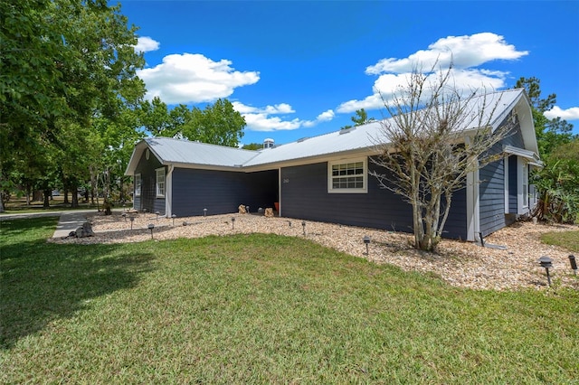 260 Country Circle Dr W, Port Orange, FL 32128 - view of front facade with metal roof and a front lawn