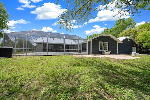 260 Country Circle Dr W, Port Orange, FL 32128 - rear view of house featuring a yard, an outdoor pool, a patio area, central AC unit, and a lanai