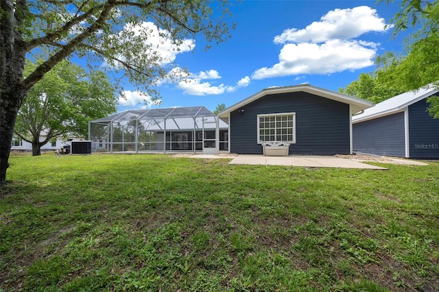 260 Country Circle Dr W, Port Orange, FL 32128 - rear view of property featuring a yard, a patio, and a lanai