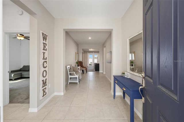 6342 SW 77th Ave, Ocala, FL 34474 - foyer with ceiling fan, baseboards, and light tile patterned floors