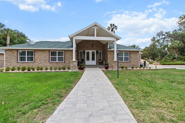 170 SW 80th St, Ocala, FL 34476 - view of front of house featuring french doors and a front yard